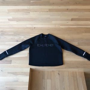 Bebe neoprene-like sweatshirt top size M